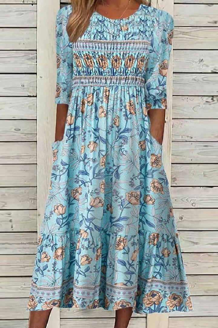 DARCIE | VESTIDO FLUÍDO COM PETÁLAS E ELEGANTE COBERTURA PARA A BARRIGA